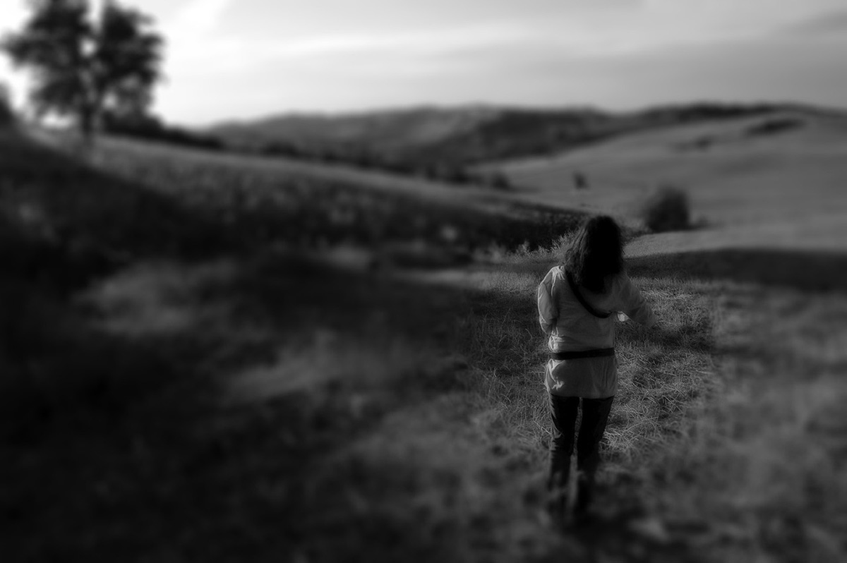 Girl on Tuscan Field in Italy